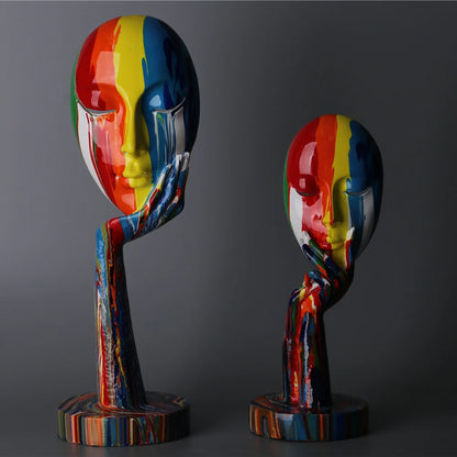 Colorful Woman Face Statues